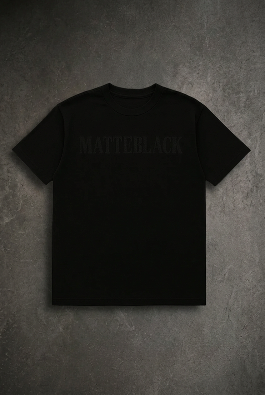 BLACK CORE T-SHIRT with matching charcoal concrete background